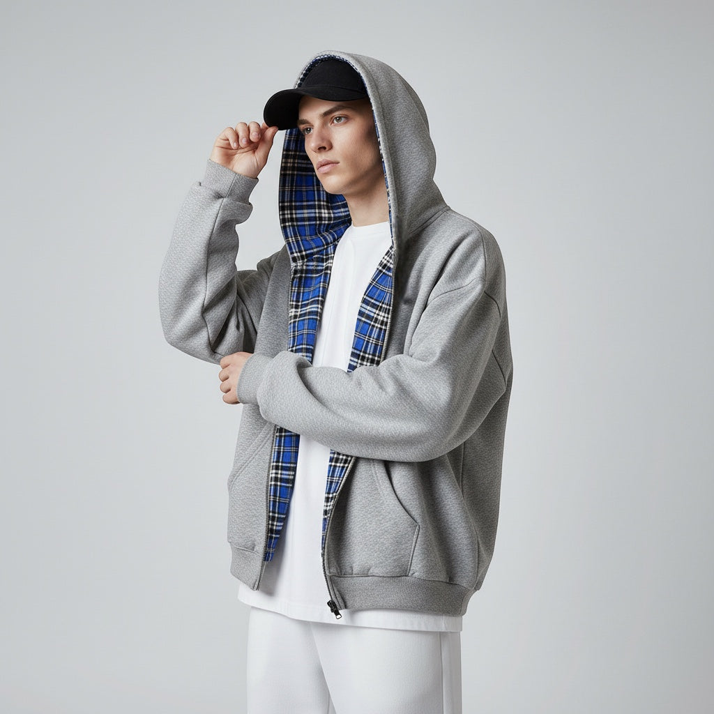 Oversized 2-in-1 Wende-Hoodie mit Karoseite