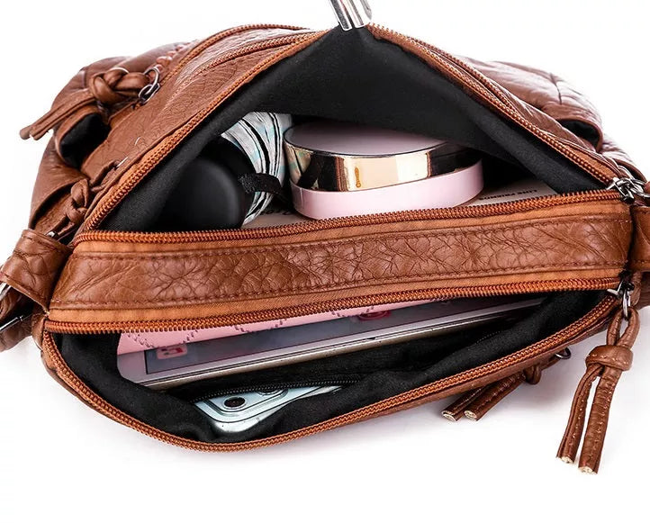 Elegante Damenhandtasche aus funktionalem, weichem Material