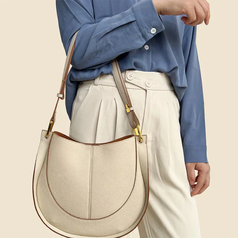 Elegante, runde Damen-Schultertasche aus Leder