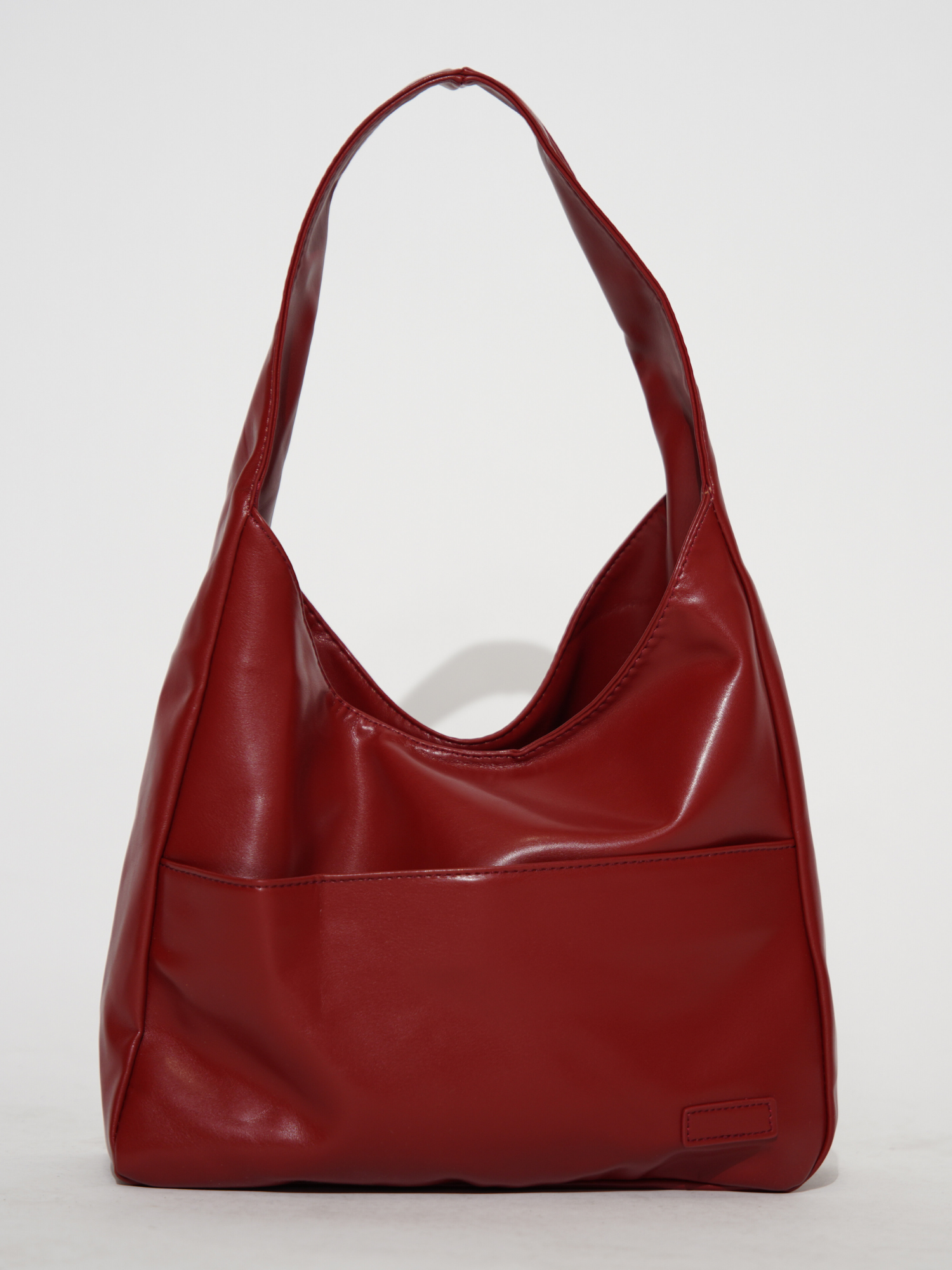 Elegante runde Schultertasche für Damen aus veganem Leder