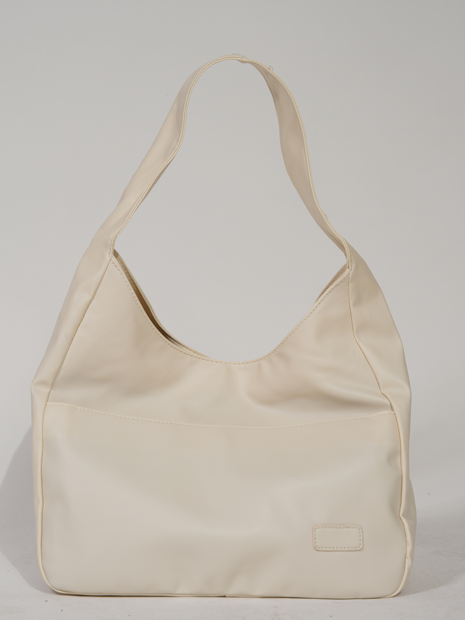 Elegante runde Schultertasche für Damen aus veganem Leder