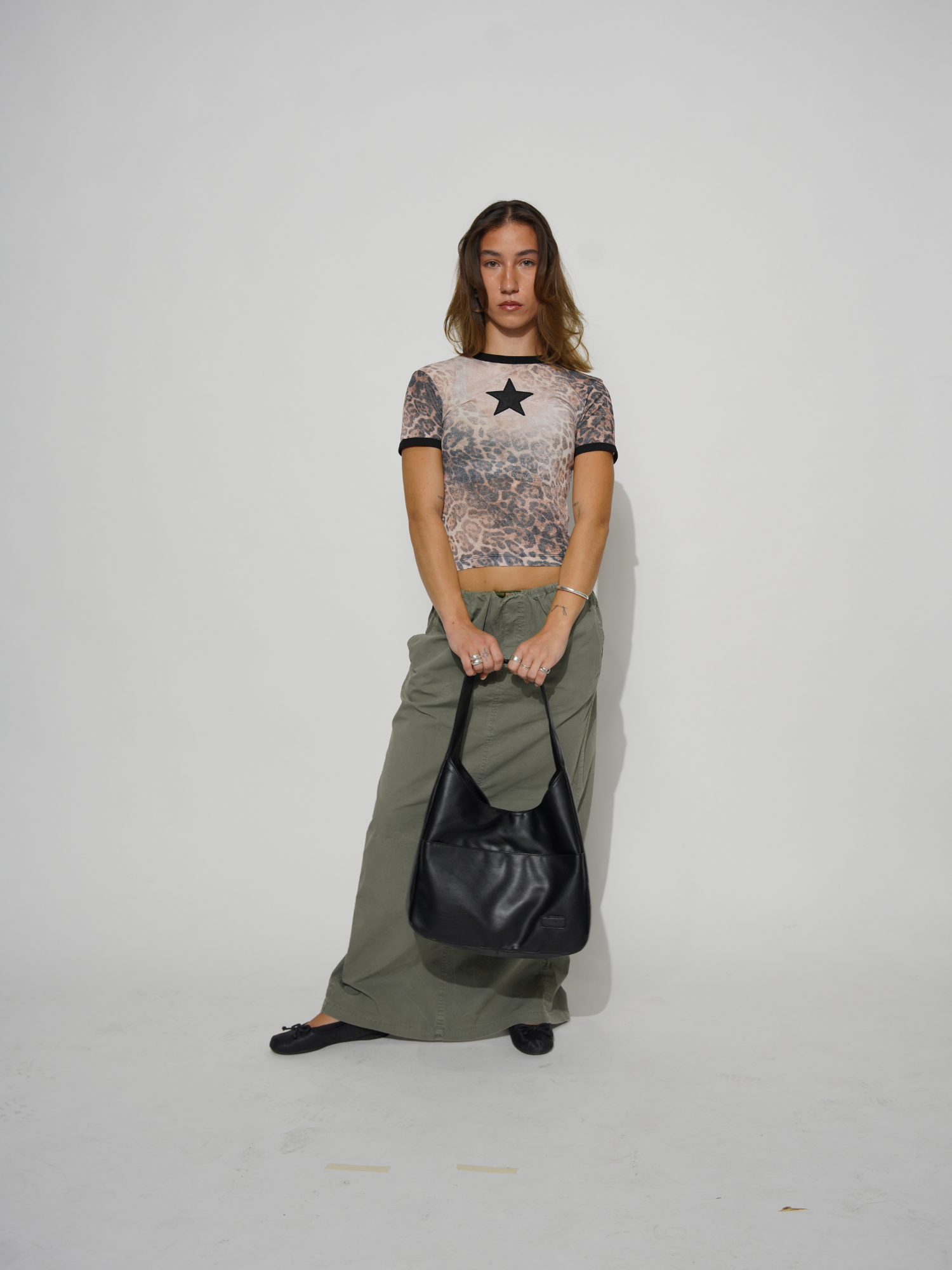 Elegante runde Schultertasche für Damen aus veganem Leder