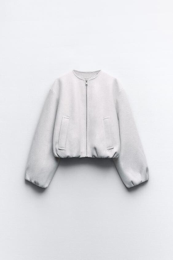 Kurze Jacke für Damen mit Puffärmeln und kragenlosem Rundhalsausschnitt