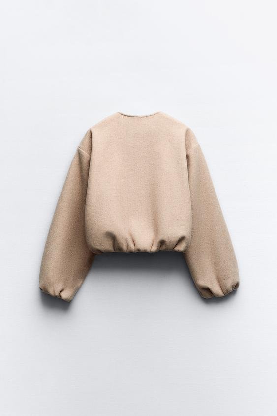 Kurze Jacke für Damen mit Puffärmeln und kragenlosem Rundhalsausschnitt