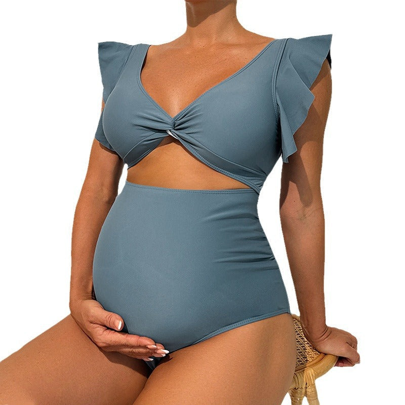 Damen Einteiler Badeanzug mit raffiniertem Wickeldetail und modischen Rüschenelementen Drune