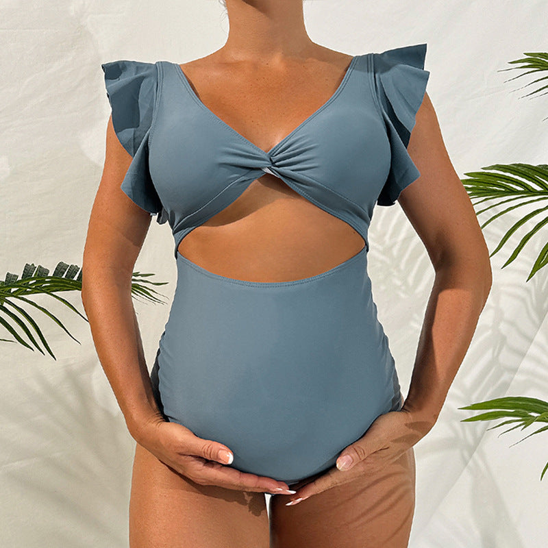 Damen Einteiler Badeanzug mit raffiniertem Wickeldetail und modischen Rüschenelementen Drune