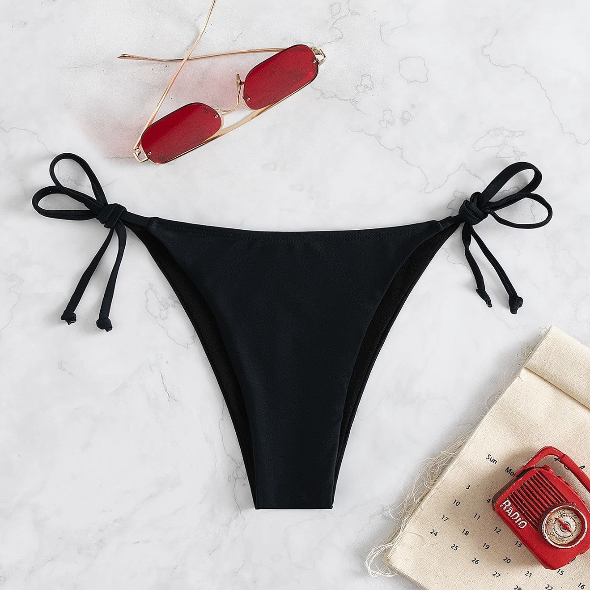 Damen Bikinislip mit verstellbaren Seitenbändern und hohem Beinausschnitt Drune