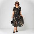 Franziska™ Kleid mit Volant und Gold-Print
