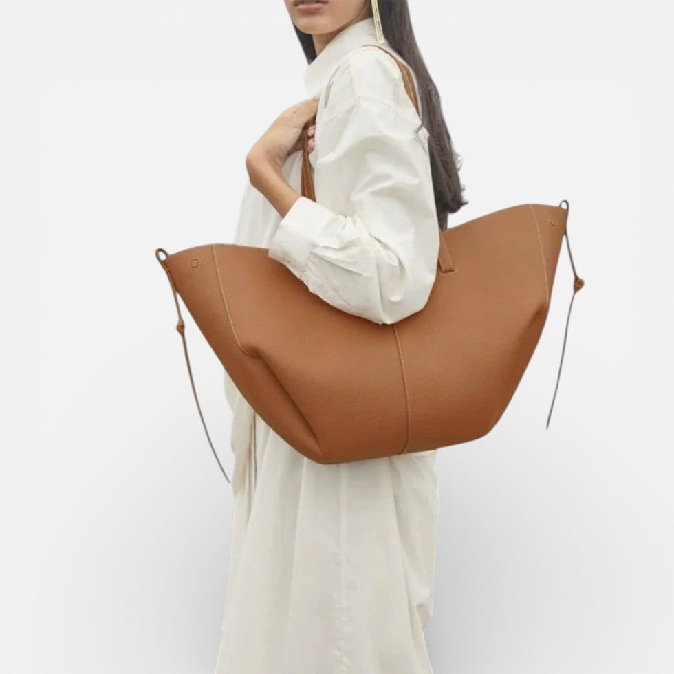Große Damen Handtasche mit breiten Seiten und Schultergriffen